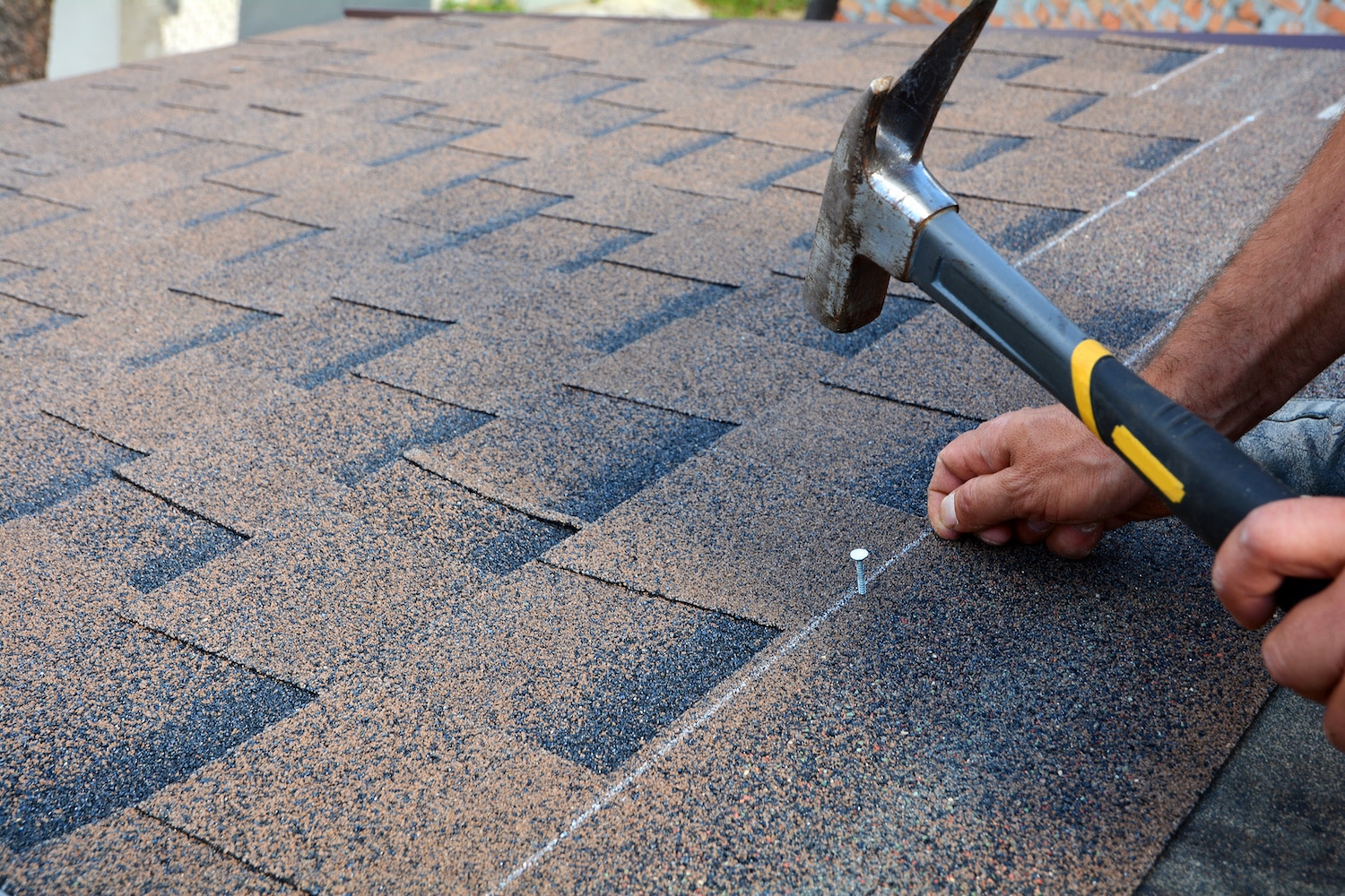 how to nail a roof shingle hammer